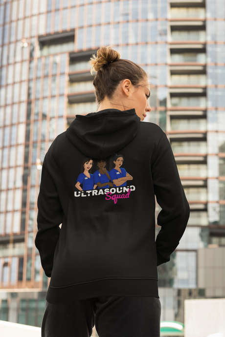 Back view of a woman wearing a zip up hoodie with an ultrasound squad design